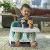 BABY EINSTEIN Podsedák na stoličku s 2 hračkami 2v1 Dine & Discover 6m+ do 23 kg 