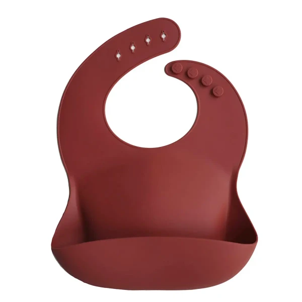 Mushie silikónový podbradník Raw Sienna