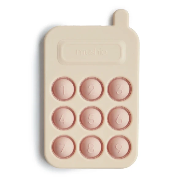 Mushie silikónová hračka pop-it Phone Blush